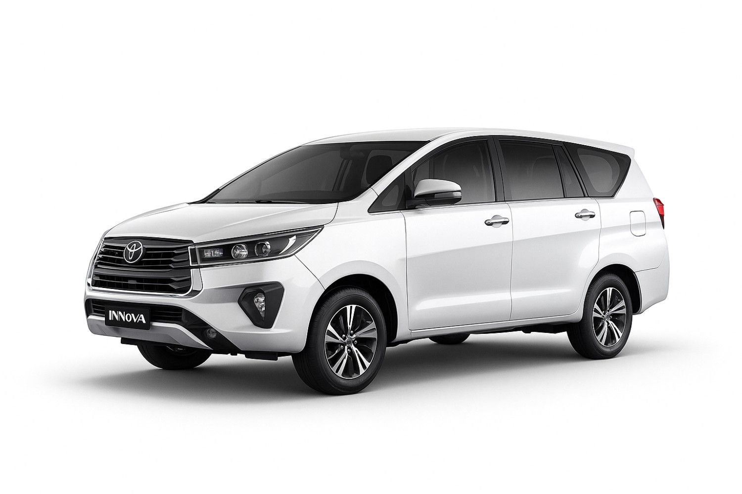 White Toyota Innova Crysta